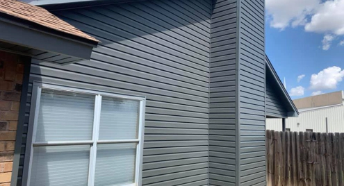 house siding painted dark gray